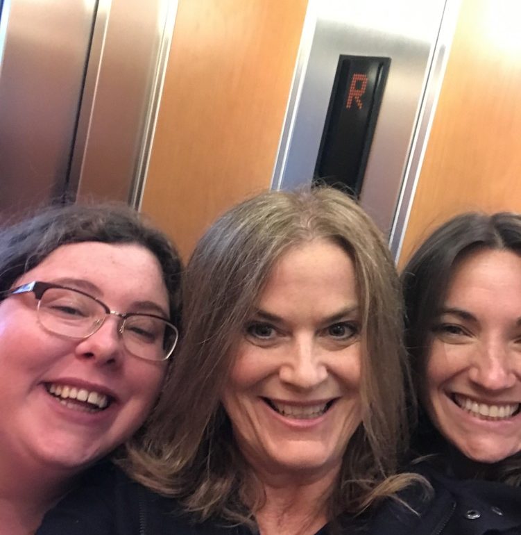 3 women in a lift