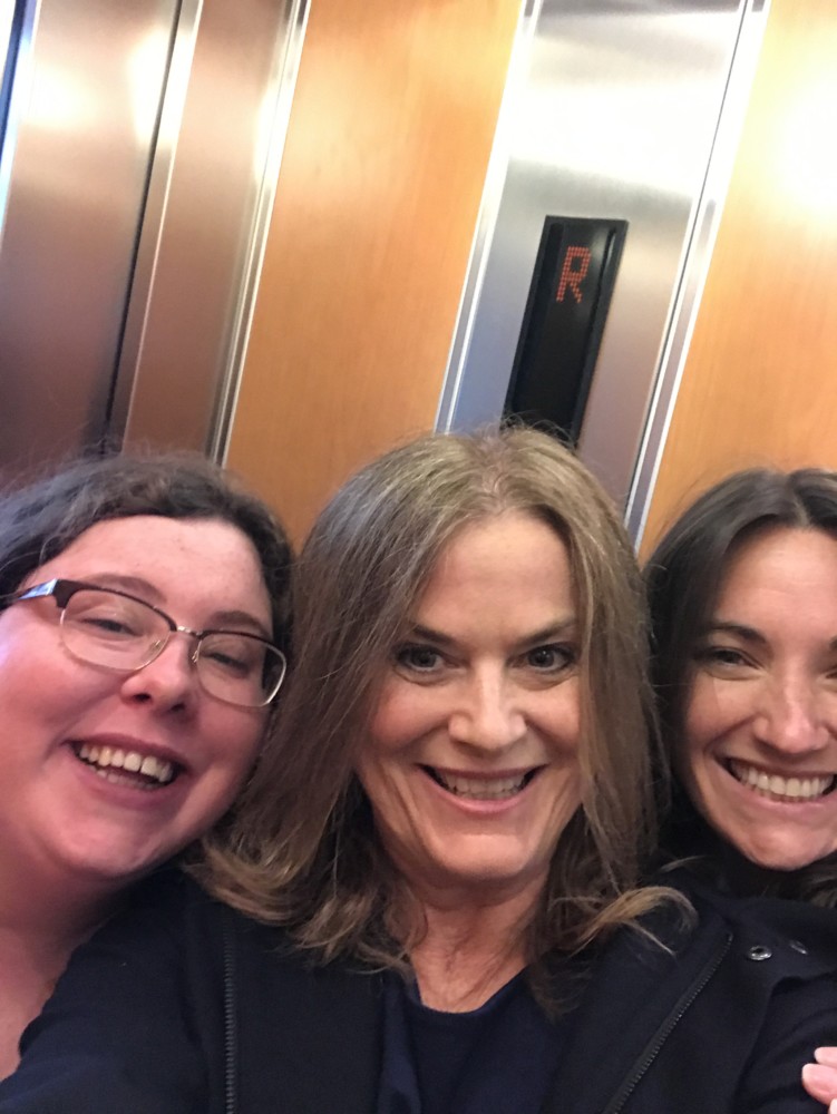 3 women in a lift